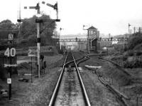 Approaching Dyce in 1974 with the road set for the Buchan line. A Swindon DMU stands at the north end of the station waiting for the section to clear. <br><br>[John McIntyre 01/06/1974]