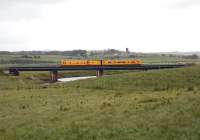 Network Rail departmental 2-car DMU southbound from Carstairs on 28 June crossing Float Viaduct.<br><br>[John Furnevel 28/06/2007]