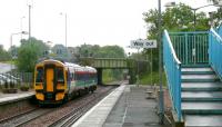 The 13.56 Dunblane-Edinburgh leaves in a cloudburst.<br><br>[Brian Forbes 02/07/2007]