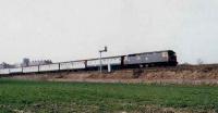 A 47/7 heads east past Waterside Junction towards Croy with a mixed rake of coaches. Locomotive <I>Lothian</I>.<br><br>[Brian Forbes /05/1985]