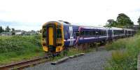 158726 & 170493 forming the 1135 Edinburgh to Perth passing Bridge of Earn. NR have since this picture was taken, erected a high chainlink fence after vandalism.<br><br>[Brian Forbes 12/07/2007]