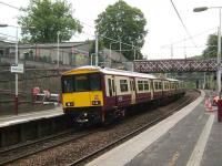 Eastbound service pauses at Cambuslang on 17 July.<br><br>[David Panton 17/07/2007]