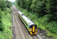 A York - Blackpool service climbs westward between Blackburn and Preston on 14 July near Hoghton.<br><br>[John McIntyre 14/07/2007]