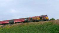 One of the class 67 hauled <I>Open Golf Championship</I> specials put on by First ScotRail operating between Edinburgh and Carnoustie near Falkland Road on 18 July.<br><br>[Brian Forbes 18/07/2007]