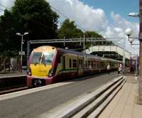 Glasgow bound service standing at Bishopton on 17 July.<br><br>[David Panton 17/07/2007]