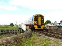 158705 crosses the swing bridge at Clachnaharry on its way to Kyle of Lochalsh.<br><br>[John Gray 23/07/2007]