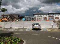 Station building framework and steps at Alloa on 24 July with dark clouds gathering over the Ochil Hills.<br><br>[John Furnevel 24/07/2007]