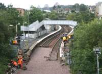 View south over Inverkeithing station during major track replacement work on 26 July 2007. The towers of the Forth Bridge can be seen breaking the horizon.<br><br>[John Furnevel 26/07/2007]