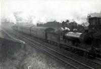 N.B. 4.4.0 62498 <i>Glen Moidart</i> banked by 0.6.2T 9148 on Polmont Train.<br><br>[G H Robin collection by courtesy of the Mitchell Library, Glasgow 20/09/1948]