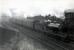 N.B. 4.4.0 62498 <i>Glen Moidart</i> banked by 0.6.2T 9148 on Polmont Train.<br><br>[G H Robin collection by courtesy of the Mitchell Library, Glasgow 20/09/1948]