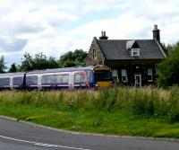 Northbound 170 passing the former station house at Forteviot.<br><br>[Brian Forbes 28/07/2007]