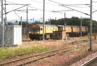 Enter <I>'The Grinder'</I>. Network Rail C102 7-module rail grinding train, photographed shortly after arrival in the CE north sidings at Carstairs on 31 July 2007.<br><br>[John Furnevel 31/07/2007]