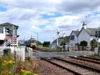 Express for Perth rattles through the crossing at Errol<br><br>[Brian Forbes 02/08/2007]