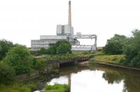 Methil power station, commissioned in 1965 to run on coal slurry from the Fife washeries and coal-bing waste. Decomissioned in 2000 the structure is seen here in July 2007 awaiting demolition. The bridge also carried traffic to the coal-drops at Methil docks (including coal from the former Wemyss Private Railway) [See image 6242]. <br><br>[John Furnevel 26/07/2007]