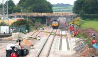 Annan - Gretna redoubling. A southbound coal train approaching Dornock on 3 August about to cross the recently replaced junction for the line into Eastriggs munitions sidings.<br><br>[John Furnevel 03/08/2007]