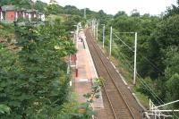 View west over Whinhill station from above Cartsburn Tunnel on 29 July 2007, looking towards Wemyss Bay.<br><br>[John Furnevel 29/07/2007]