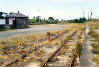 Auchinleck Yard looking a little worse for wear. View looks to Glasgow. Semaphore signals long gone.<br><br>[Ewan Crawford //1989]