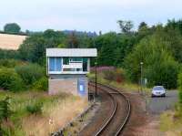 Cabin at Stanley Junction. A double line to single line junction, the former Strathmore main line diverged to the right where the car stands. The line going around the box is the Highland Main line for Inverness.<br><br>[Brian Forbes 10/08/2007]