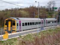 158 set in Alphaline livery seen on 9 April forming a Waverley service at Newcraighall.<br><br>[David Panton 9/04/2007]