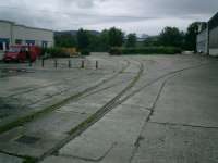 Former Allied Distillers yard at Castle Street with rails on siding of NBR Glasgow Dumbarton & Helensburgh line. As of December 2007 the site has been cleared for redevelopment.<br><br>[Alistair MacKenzie 18/08/2007]