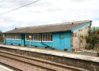 Waiting area/shelter on the up side at Chathill in August 2007. Still standing, albeit looking in need of a little support.<br><br>[John Furnevel 16/08/2007]