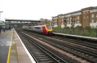 A Virgin Voyager calls at Kensington Olympia with the 0933 Birmingham New Street - Brighton on a rather dreich 22 August 2007. <br><br>[Michael Gibb 22/8/2007]