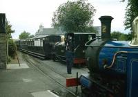 No 10 arrives at Ballasalla in July 1996 as the crew exchange single-line staffs with the signalman. Meantime no 12 waits with a train for Port Erin. <br><br>[John McIntyre /07/1996]