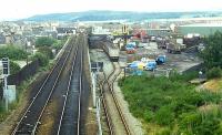 The approach to Ness Viaduct (buffers on both left hand lines) and the stub of the harbour branch in use as a coal depot in 1989. The sidings later came into use for Safeway container trains.<br><br>[Ewan Crawford //1989]