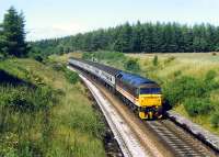 A southbound 47 passes the closed station at Culloden before heading out onto the viaduct.<br><br>[Ewan Crawford //1989]