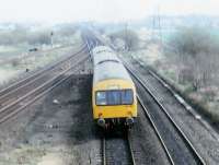 On a frosty morning in January 1989, a Glasgow - Falkirk class 101 DMU heads north over the former double lead junction.<br><br>[Brian Forbes 15/01/1989]