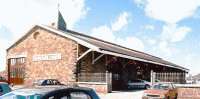 The former broad gauge goods shed at Barnstaple Victoria Road station (Western terminus of the Devon and Somerset Railway) is now assured of a good future, as it has been sympathetically restored as a church building. The former goods office is in use as the church office.<br><br>[Ken Strachan //2007]