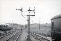 The Approach. HR 4.4.0 14398 <i>Ben Alder</i> taking water. Thurso - Britains furthest north station.<br><br>[G H Robin collection by courtesy of the Mitchell Library, Glasgow 03/07/1950]