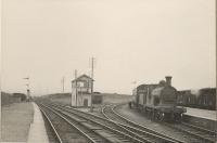 Georgemas Junction - Britains furthest north junction. HR 4.4.0 14399 <i>Ben Alder</i> at Thurso platform.<br><br>[G H Robin collection by courtesy of the Mitchell Library, Glasgow 03/07/1950]