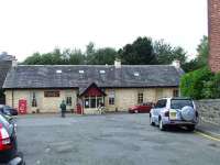 Kilmacolm Station, now the Pullman Tavern, showing the car park and station buildings. <br><br>[Graham Morgan 30/08/2007]