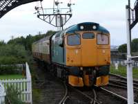 27001 arriving with a service from Birkhill. The second man is ready to give up section token. 27001 is the earliest of a fleet of 96 1260hp Bo-Bo diesel locos built for British Railways in 1957.<br><br>[Brian Forbes 02/09/2007]