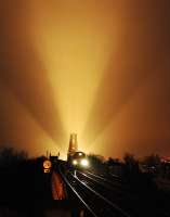 Coal train coming off the Forth Bridge into North Queensferry on a slightly foggy night in December 2004.<br><br>[Ewan Crawford 11/12/2004]