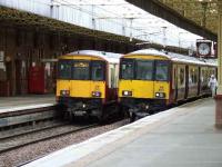 318270 and 318253 at Paisley Gilmour Street.<br><br>[Graham Morgan 31/08/2007]