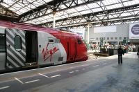 A Virgin Voyager for Manchester Piccadilly boards at Waverley platform 14 on 6 September 2007. <br><br>[John Furnevel 06/09/2007]