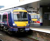 Cross platform interchange between First Scotrail commuter services at Haymarket in September 2007. A Waverley bound train at platform 1 picks up onward passengers off a terminated service from Cowdenbeath at platform 0 during the major ongoing structural works at Waverley station. <br><br>[John Furnevel 6/09/2007]