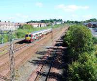 Glasgow bound 334 at Arkleston Junction. The old Renfrew line trackbed is overgrown as are what remains of the CE sidings (distant right).<br><br>[Ewan Crawford 10/09/2007]