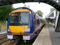 170 428 with buffers</I> whitewashed, calling at Dunkeld & Birnam.<br>
The yellow portable steps are used for low platform access.<br><br>[Brian Forbes 13/9/2007]