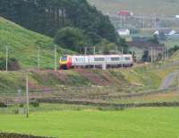 A northbound Voyager approaching Abington on 3 August 2007, with traffic on the M74 motorway in the background.<br><br>[John Furnevel 03/08/2007]