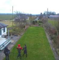 Filming taking place at the former Hassendean station on 21 February. View is south from the footbridge. In the background is the road bridge from which a well-known Robin Barbour mystery photograph was taken many years earlier [see image 28700].<br><br>[Bruce McCartney 21/02/2013]