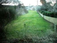 A view of the track-bed from the junction with the main line, down to the distillery.<br><br>[Matthew Tomlins /04/2007]