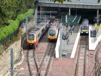 View over the north side platforms at Waverley on 18 September 2007 from the Scottish National Gallery. A Voyager bound for the ECML is running into platform 20 alongside the 10.10 Pendolino to Euston (which arrived at Waverley as the 0841 <I>local</I> service from Carstairs.) A Dundee train is awaiting departure time in single line bay platform 18.<br><br>[John Furnevel 18/09/2007]