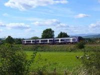 <I>Sheep May Safely Graze</I>, the popular pastoral music, is suggested here, as a 170 for Edinburgh passes Balgonie Farm.<br><br>[Brian Forbes /09/2007]