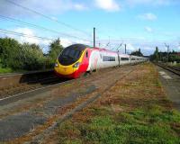 Northbound Pendolino speeds through Leyland on 25 August.<br><br>[John McIntyre 25/8/2007]