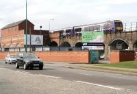 A northbound service off the Tay Bridge runs down into Dundee on 20 September passing the bridge maintenance centre, formerly Esplanade station. <br><br>[John Furnevel 20/9/2007]