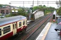 An Airdrie service leaving Anniesland southbound on 23 September 2007. The train is about to cross the bridge over Great Western Road, installed in 1930 when the road was widened.<br><br>[John Furnevel 23/9/2007]