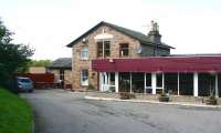 Approach to the former station forecourt at Meikle Ferry in August 2007. The building is now part of a local holiday complex.<br><br>[John Furnevel 25/8/2007]